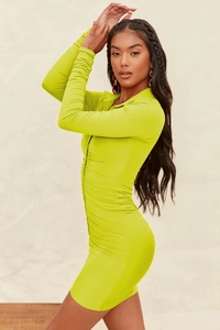 Detail view of neon green mini dress featuring a lapel collar and drawstring ruching