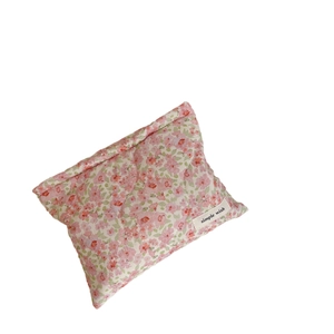 Pink floral quilted cosmetic bag with cotton padding and simple wish fabric label
