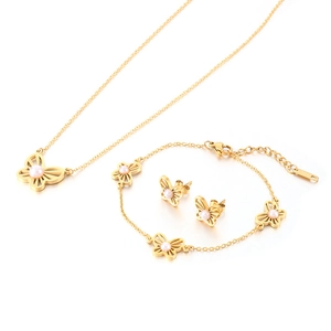 Golden hollow butterfly jewelry set with pearls including necklace bracelet and earrings