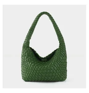 Detailed view of dark green hand-woven Hobo bag featuring premium Intrecciato craft