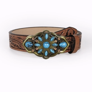 Vintage brown leather belt with embossed floral patterns and turquoise gemstone buckle