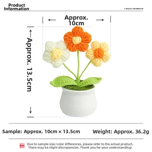 Detailed dimensions of handmade crochet potted flowers featuring white and orange knit blooms