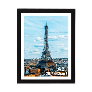 Detailed view of black A3 photo frame featuring a white mat and Eiffel Tower art print