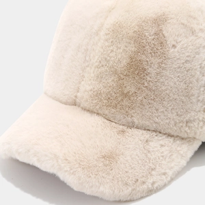 Soft cream faux fur baseball cap for women with a minimalist short brim for winter warmth