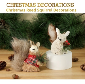 Detail of Christmas straw squirrels with pine cones on rustic wooden display