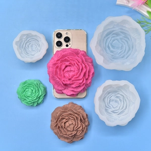 Stampi in silicone per peonia in tre dimensioni con campioni di sapone e candele