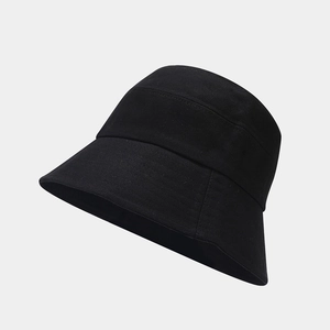 Classic black cotton canvas bucket hat featuring a minimalist sun protection design
