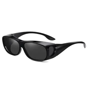Polarized black wrap-around sunglasses with side windows for driving and night vision