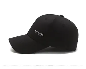 Detailed side view of a black baseball cap with SPORT FASHION CAP embroidery on cotton canvas