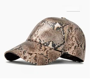 Detailed close-up of khaki faux leather baseball cap with realistic snake skin texture