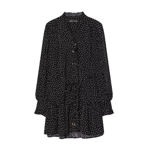 Fashionable long sleeve ruffle dress in black with white polka dots and drawstring waist