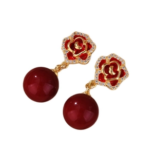 Élégantes boucles d'oreilles pendantes rose dorées avec émail rouge et zircons