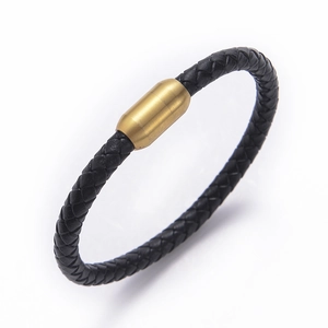 Close-up of black braided leather bracelet with golden stainless steel magnetic clasp