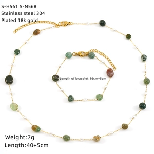 Detailed view of 18k gold plated stainless steel necklace and bracelet with natural stones