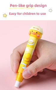 Detailed view of yellow cartoon duck retractable eraser pen with comfortable ergonomic grip