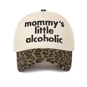 Close-up of baseball cap featuring leopard print brim and Mommy's Little Alcoholic text