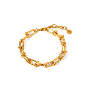 Vue détaillée du bracelet à maillons en U dorés avec accents sphériques et chaîne réglable