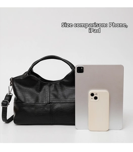 Medium black lychee leather handbag size comparison with iPad and mobile phone