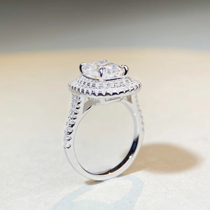 Macro view of luxury S925 silver ring featuring a tiered rectangular moissanite setting