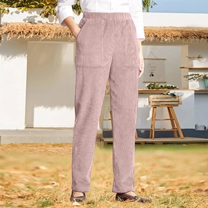 Detail of pink corduroy pants showing vertical texture and wide side pockets