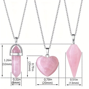 Three-piece rose quartz necklace set with hexagonal prism, heart, and cone shaped crystal pendants