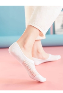 Side view of white mesh breathable no-show cotton socks for women on feet