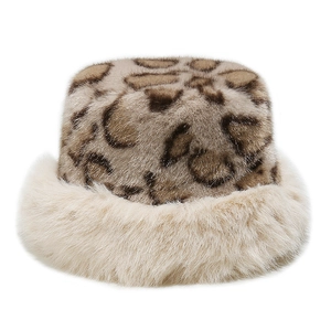 Detail of winter leopard print bucket hat with fluffy faux fur trim and warm lining