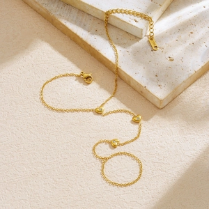 Gold-plated stainless steel hand chain featuring diamond-encrusted heart charms