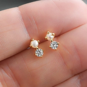 S925 sterling silver pearl stud earrings with diamond accents in a gold finish setting