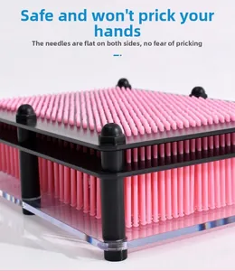 Detail of pink 3D pin art toy showing smooth rounded plastic pins and safety frame