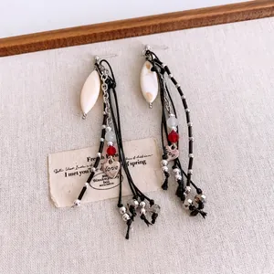 Bohemian silver needle shell heart tassel earrings with black cords and red glass beads