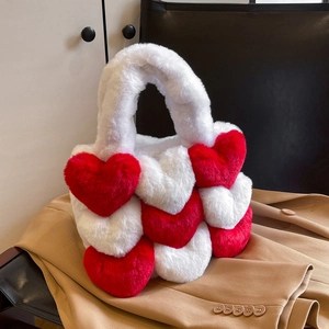 Detailed view of the red and white plush heart tote bag texture on a suit jacket