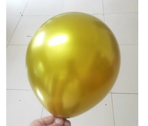 Close-up of a 10-inch metallic gold latex balloon with a shiny reflective finish
