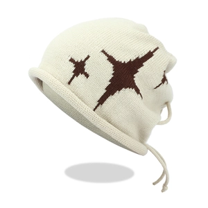Detail of star jacquard pattern and adjustable drawstring on beige knit beanie hat