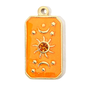 Detail of a rectangular sun pendant with orange enamel and a yellow zircon inlay