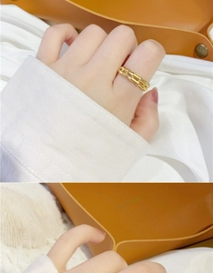 Macro detail of a 18K gold plated double-layer bamboo design ring for women