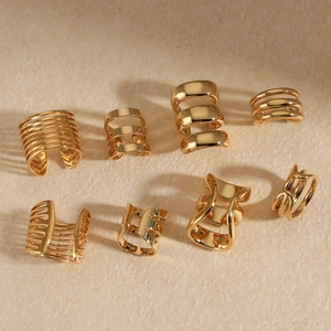 8-piece set of minimalist gold stainless steel ear cuffs featuring geometric open designs