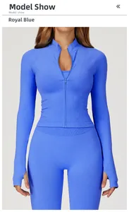 Detail of royal blue seamless yoga jacket with thumbholes and ribbed knit texture