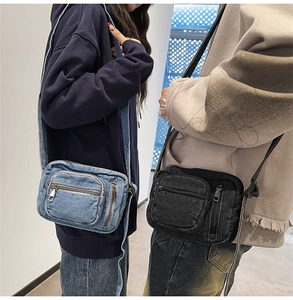 Dual-view of blue and black washed denim crossbody bags with adjustable shoulder straps