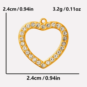 Detail view of gold hollow heart pendant with crystal border including size and weight info