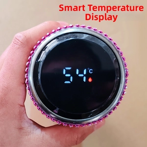 Close-up of smart vacuum flask lid with LED temperature display and pink rhinestones