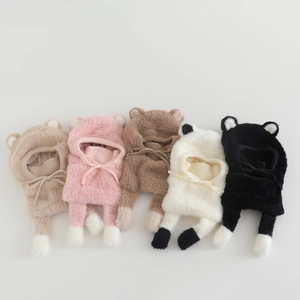 Close-up of plush bear ear balaclava hats for children in five neutral color options
