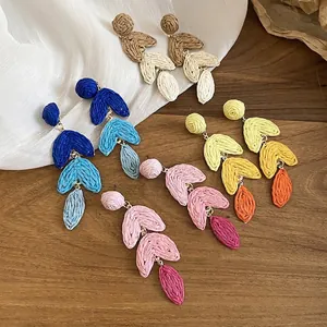 Bohemian raffia tassel earrings in four colors for beach vacations and summer style
