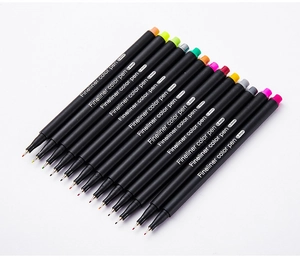 Detailed flat lay of 12 colorful 0.4mm fineliner pens for drawing on white background