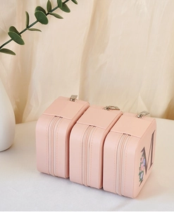 Pink PU leather travel jewelry case with mirror, zipper closure and floral letter M