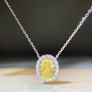 925 silver necklace featuring an oval yellow gemstone pendant with ice flower cut halo