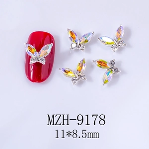 Detailed macro view of 3D alloy butterfly nail charm with aurora rhinestones 11x8.5mm