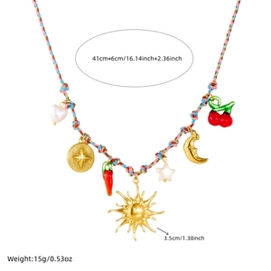 Colorful woven necklace with gold sun, moon, stars, and pepper charms in a vibrant design