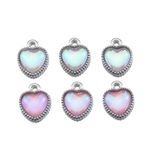 Detail view of heart-shaped DIY alloy pendants with laser luster and silver beaded borders