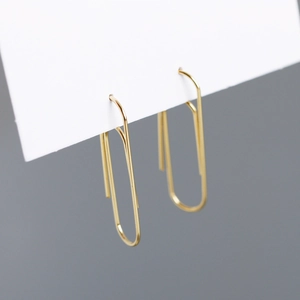 Minimalist s925 silver paperclip drop earrings in a polished golden metal finish